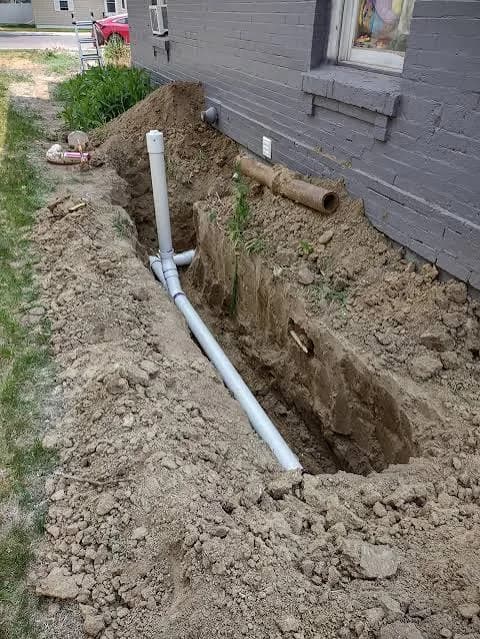 Sewer line trench excavation with cleanout access